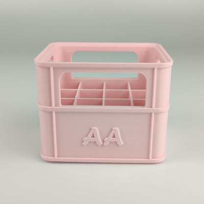 Batteriekiste für AA-Batterien in der Farbe Pfirsich Rosa.