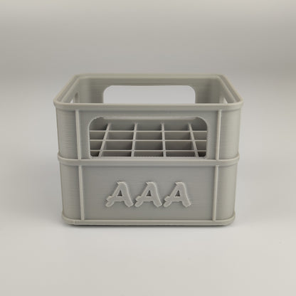 Batteriekiste für AAA-Batterien in der Farbe Grau.