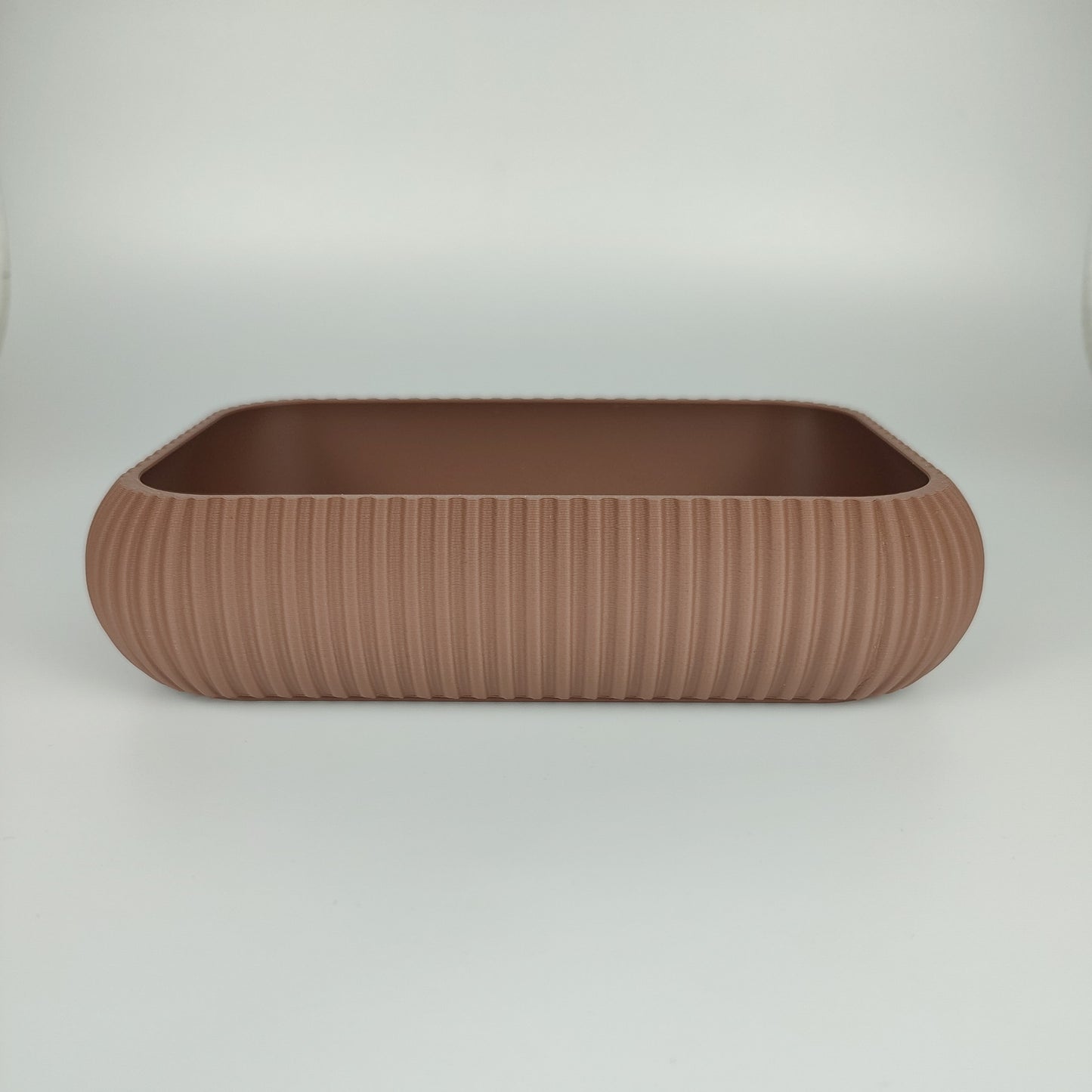 Große Dekoschale in der Farbe Dunkelbraun.