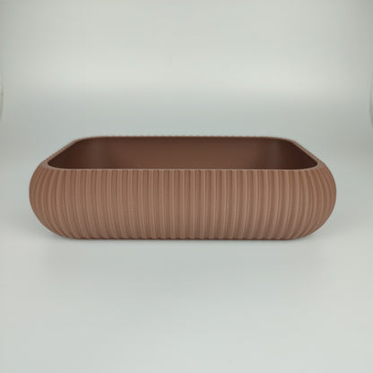 Große Dekoschale in der Farbe Dunkelbraun.