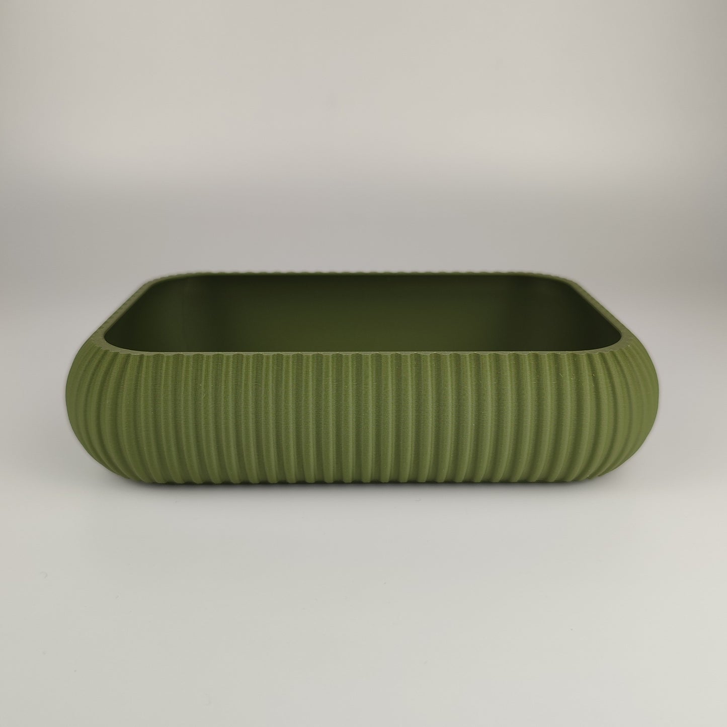 Große Dekoschale in der Farbe Olive Grün.