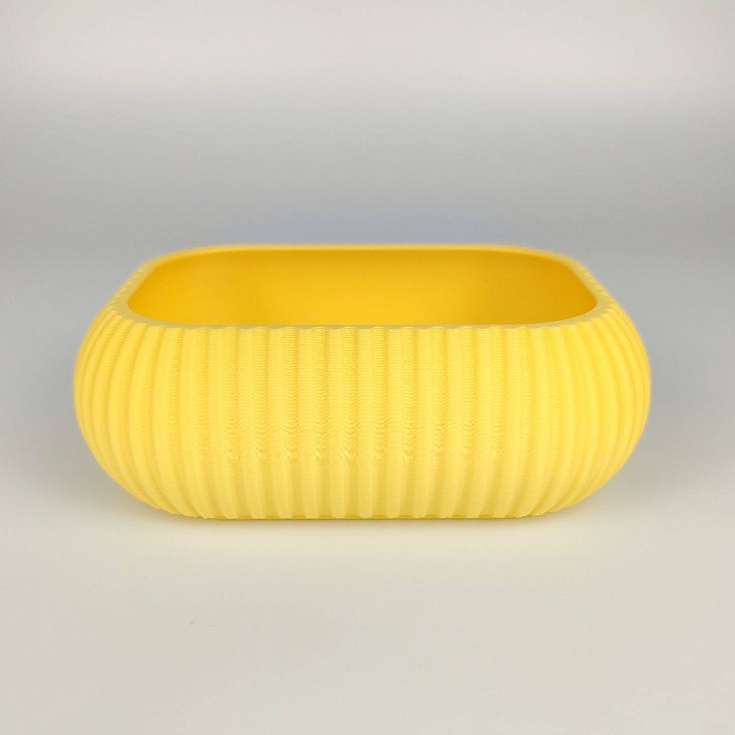 Kleine Dekoschale in der Farbe Zitronengelb.