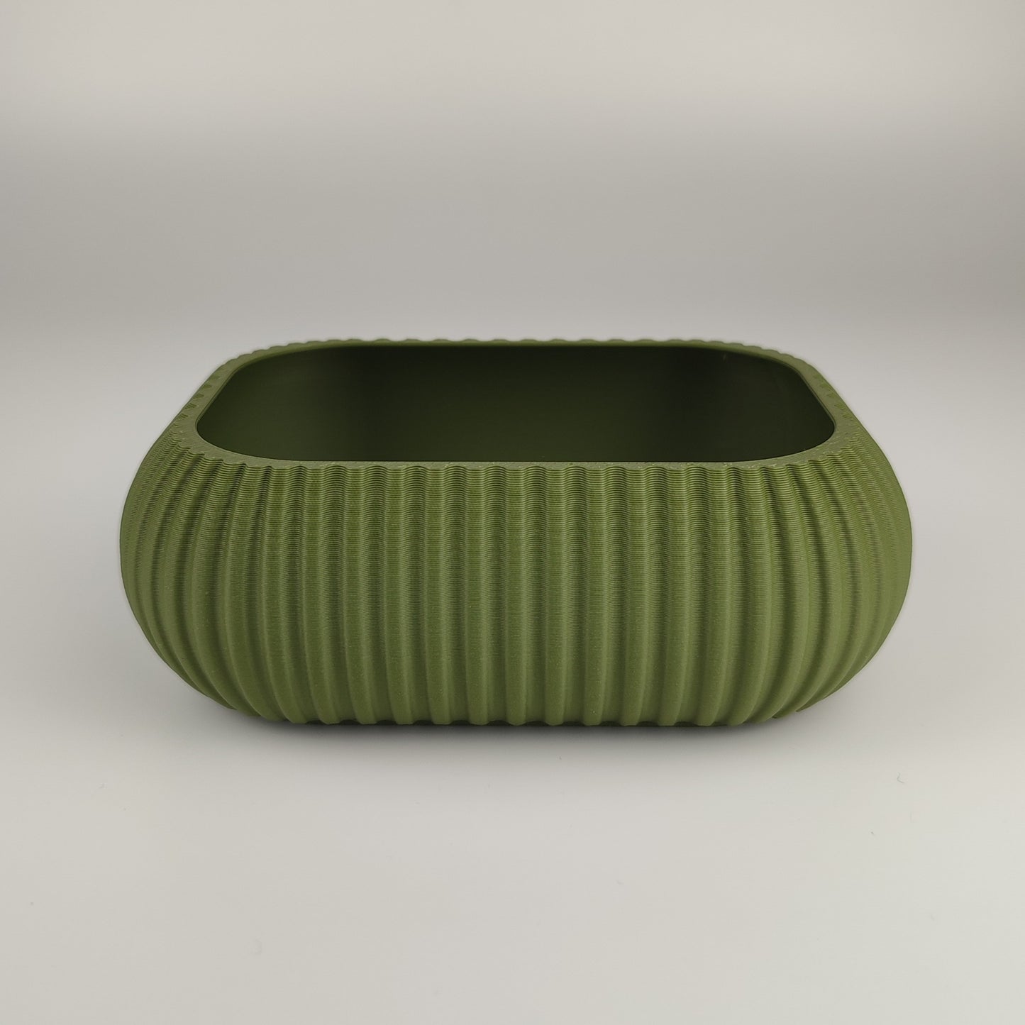 Kleine Dekoschale in der Farbe Olive Grün.