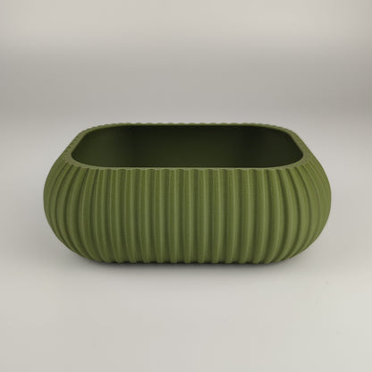 Kleine Dekoschale in der Farbe Olive Grün.